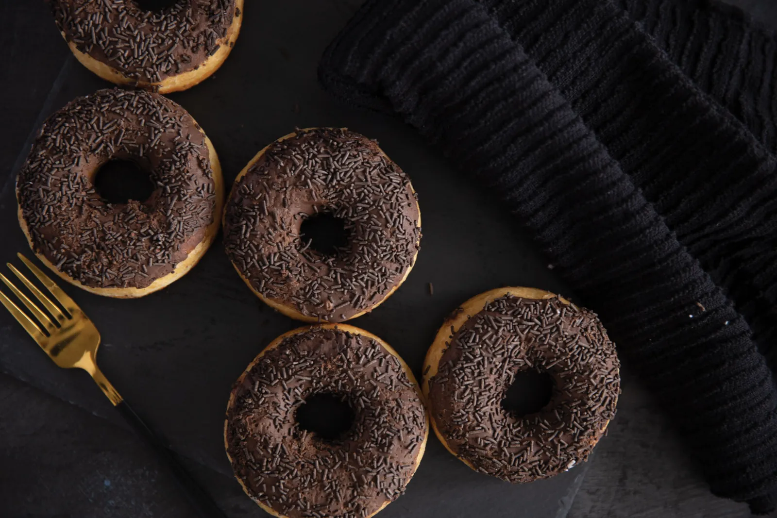 Chocolate sprinkle mini donuts from The Hole Story, live mini donut catering in OKC